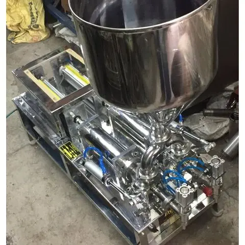 DOUBLE HEAD LIQUID FILLING MACHINE WITH 100-1000 ML CAPACITY