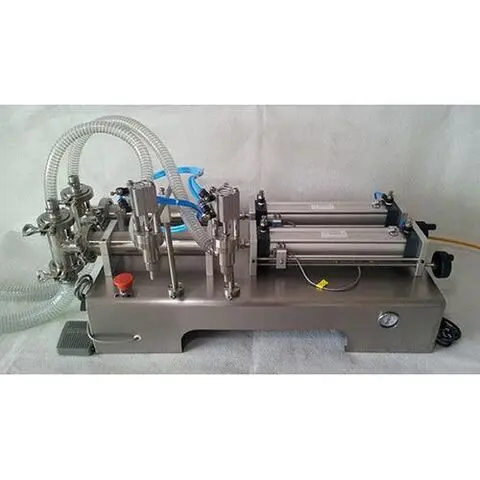 DOUBLE HEADED LIQUID PACKAGING MACHINE WITH 50-500 ML CAPACITY